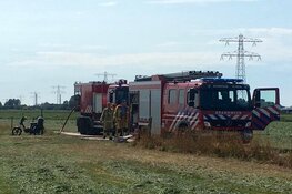 Tractor in brand in Uitgeest