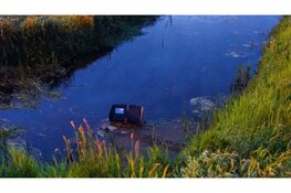 Persoon op scootmobiel te water in Heemskerk