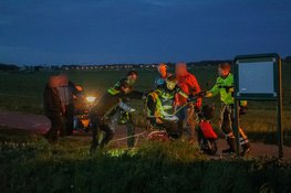 Persoon op scootmobiel te water in Heemskerk